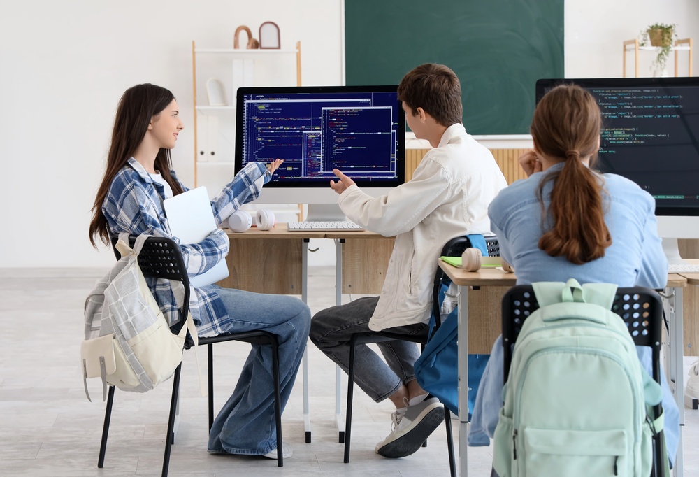 Teenage,Students,Studying,At,School,Computer,Lab
