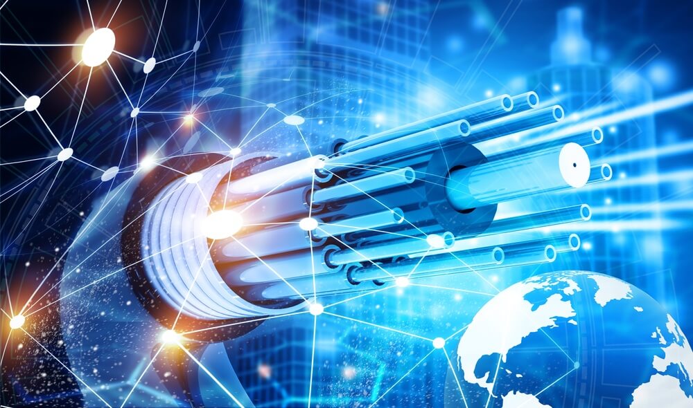 Glowing,Fiber,Optic,Cables,Transmitting,High-speed,Data,Across,A,Blue